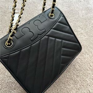 TB black handbag